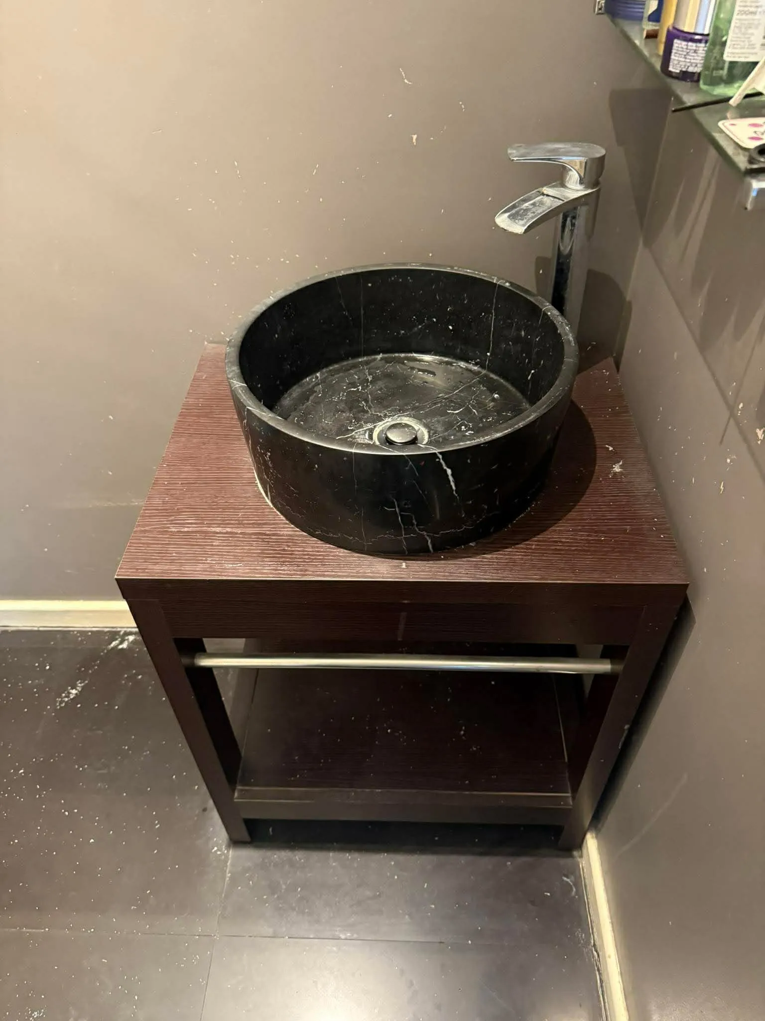 Stone vessel basin plumbed in on a local bathroom installation